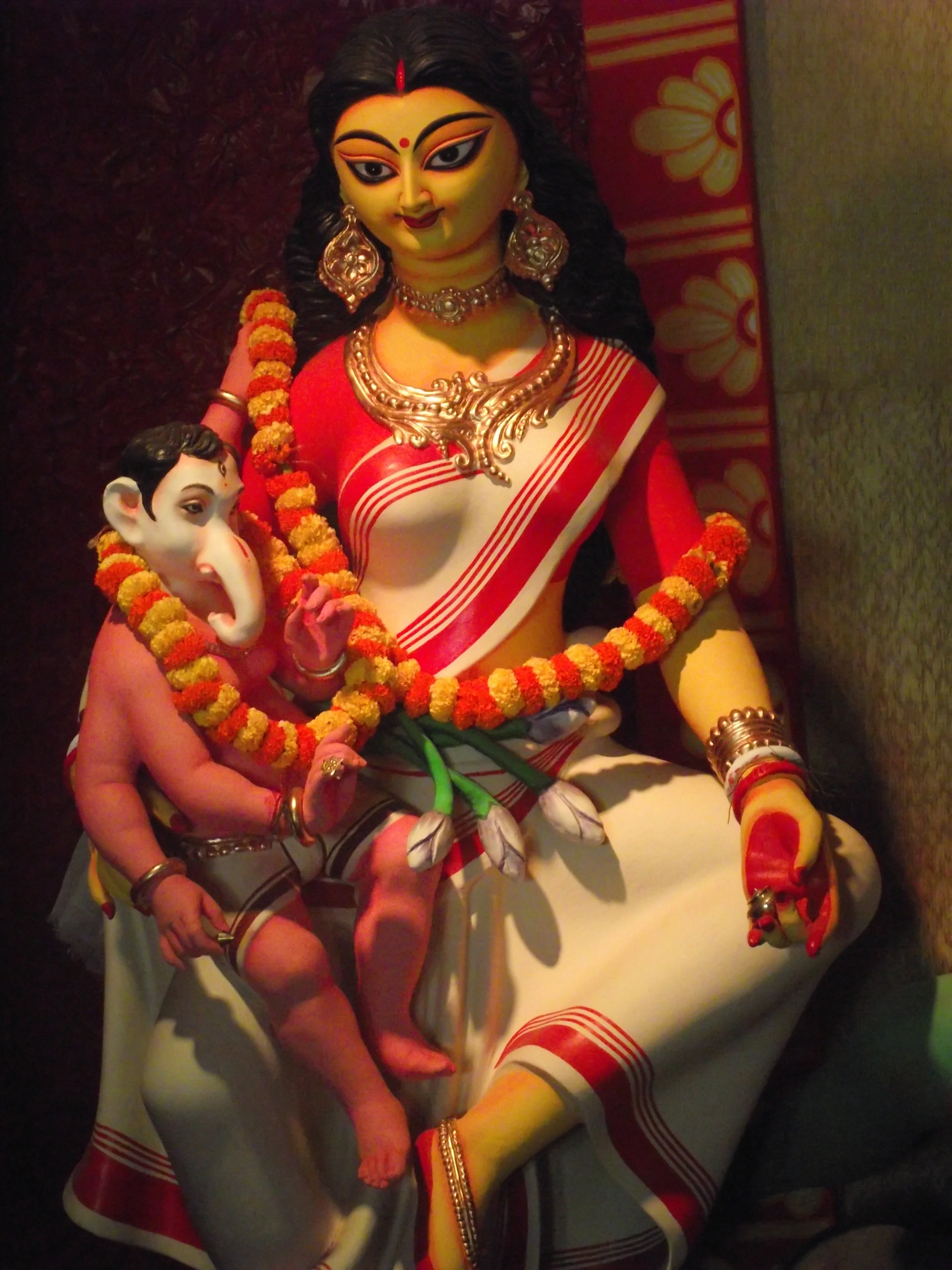  Ganesha in the lap of Laxmi! 