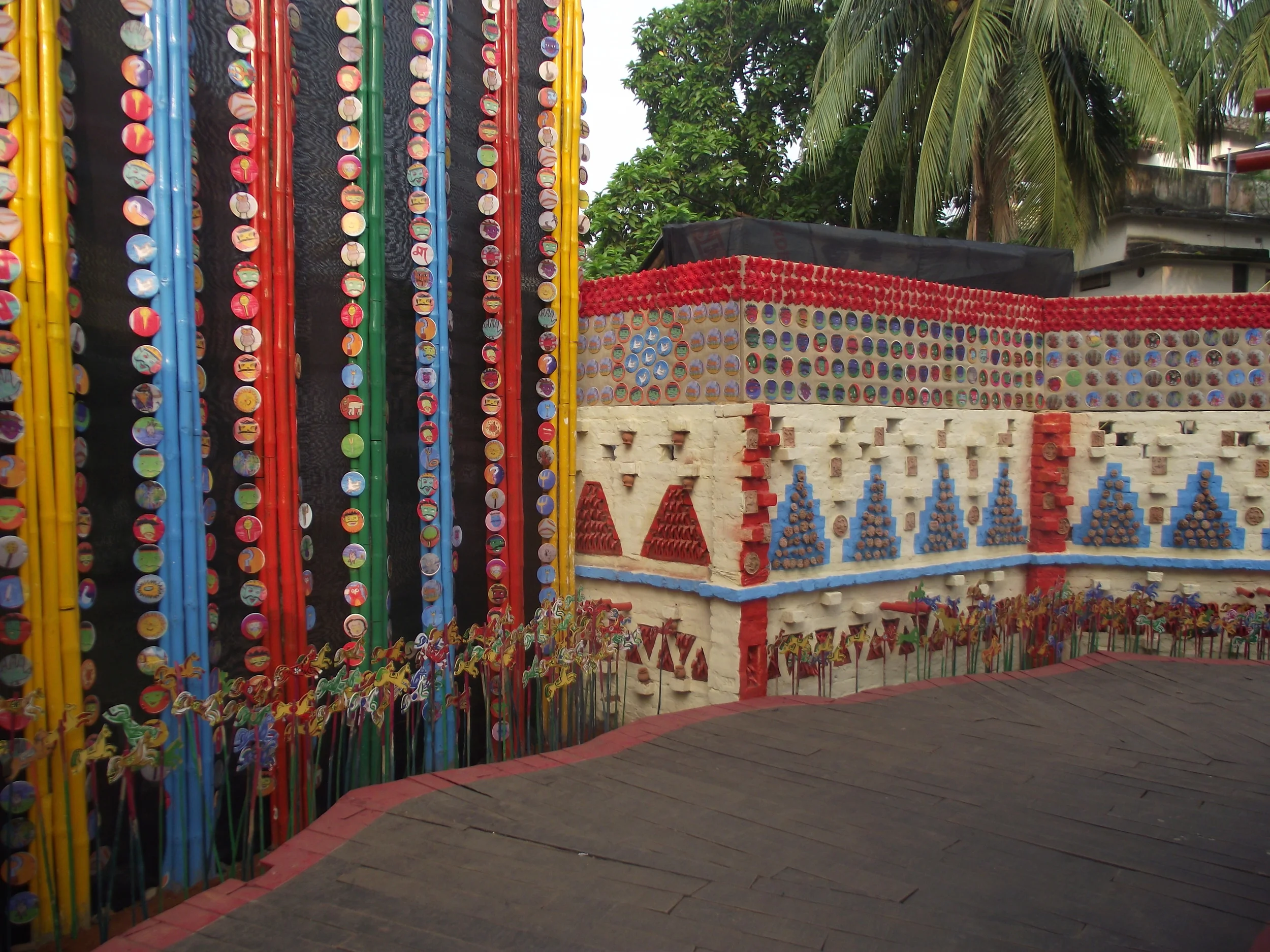  Colourful demonstration in the main section of the pandal. Modern form of art with different types of claywork and use of lots of colours made the place very lively. 