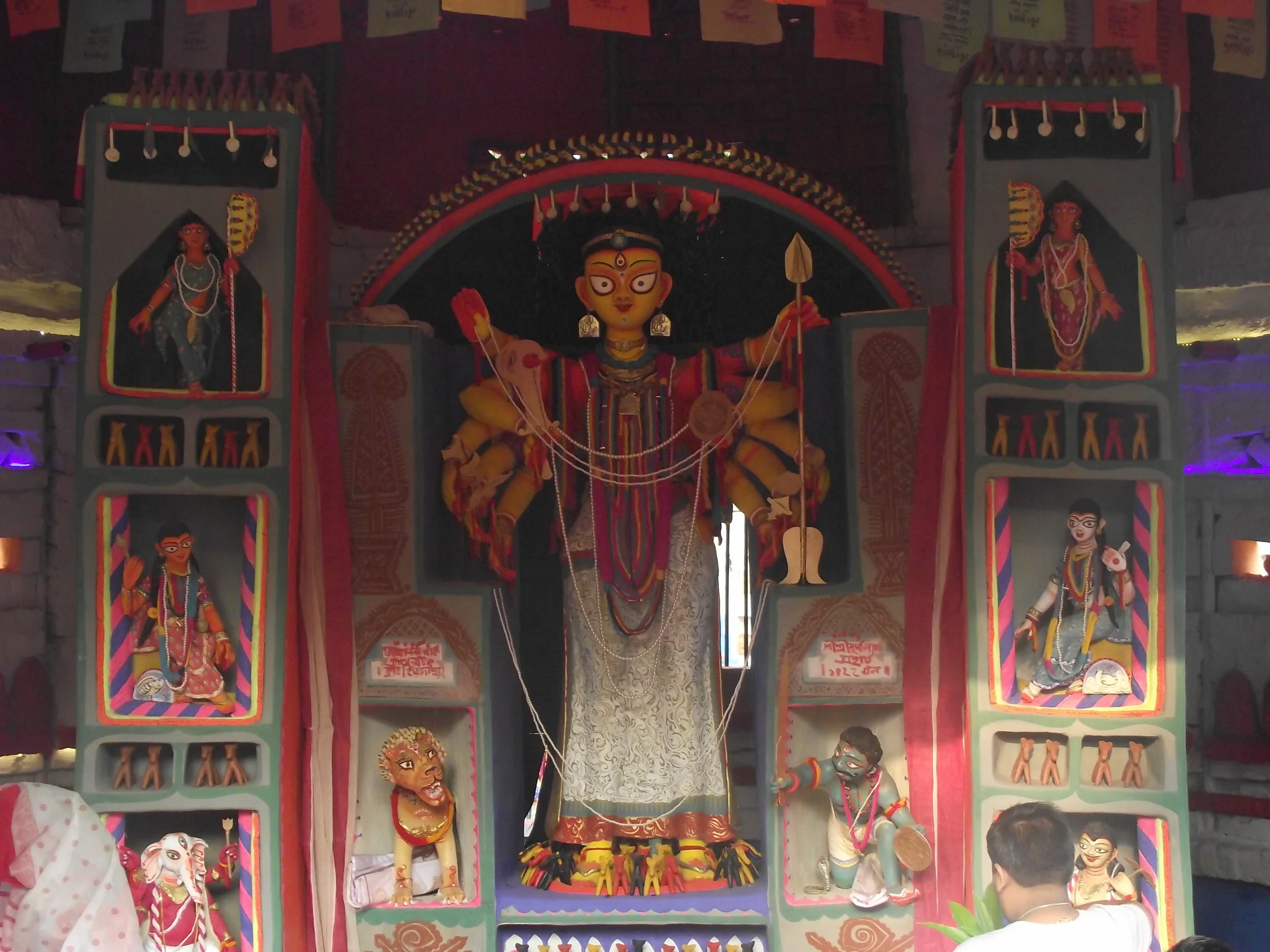  Fantastic creativity. Observe the way Laxmi, Saraswati, Karthik and Ganesh has been arranged. Also the manner in which lion and asura has been depicted! 