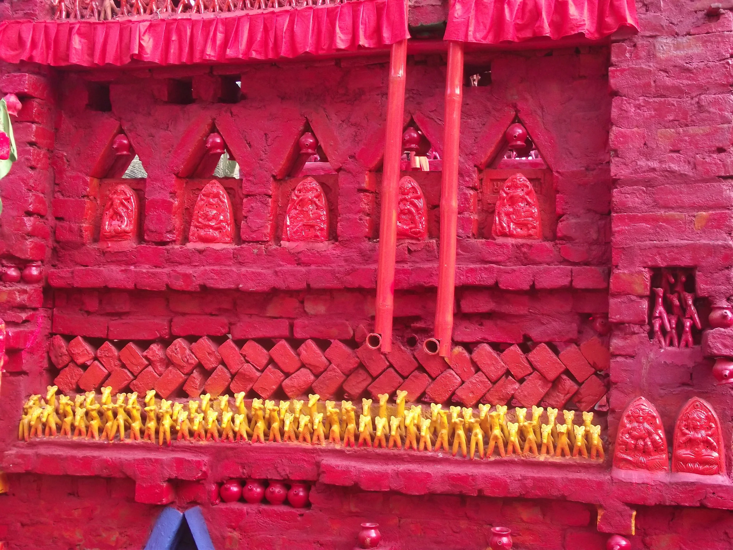  Another view of the colourful imagination and use of clay dolls. 