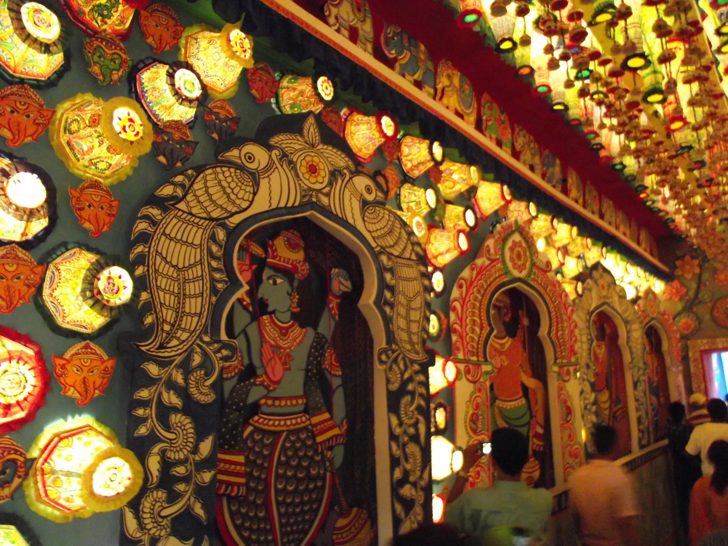  Absolute festival brightness glittering through those Raghurajpur lampshades and around the Raghurajpur canvases. 