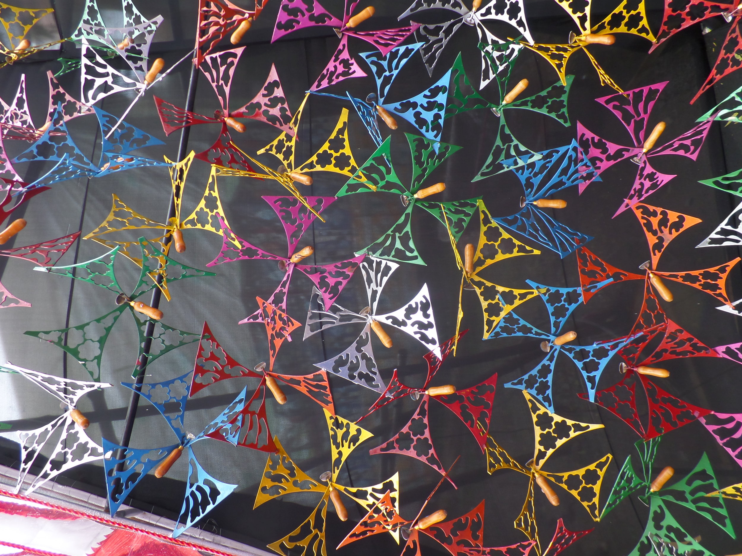  Colourful depiction of freedom. Observe the wings created through symmetric pieces of metals. Contemporary art at its best. 