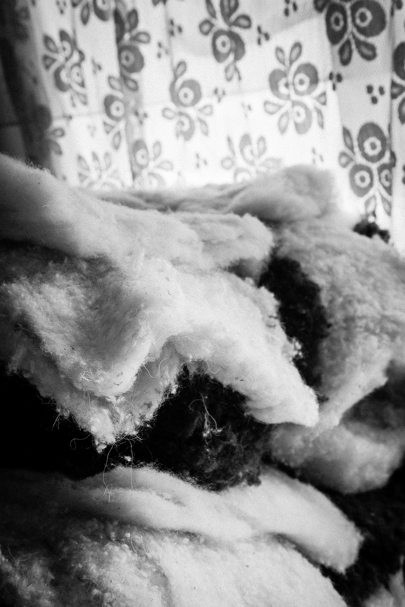 A pile of carded wool sheets ready for felting (at Angel Felting).