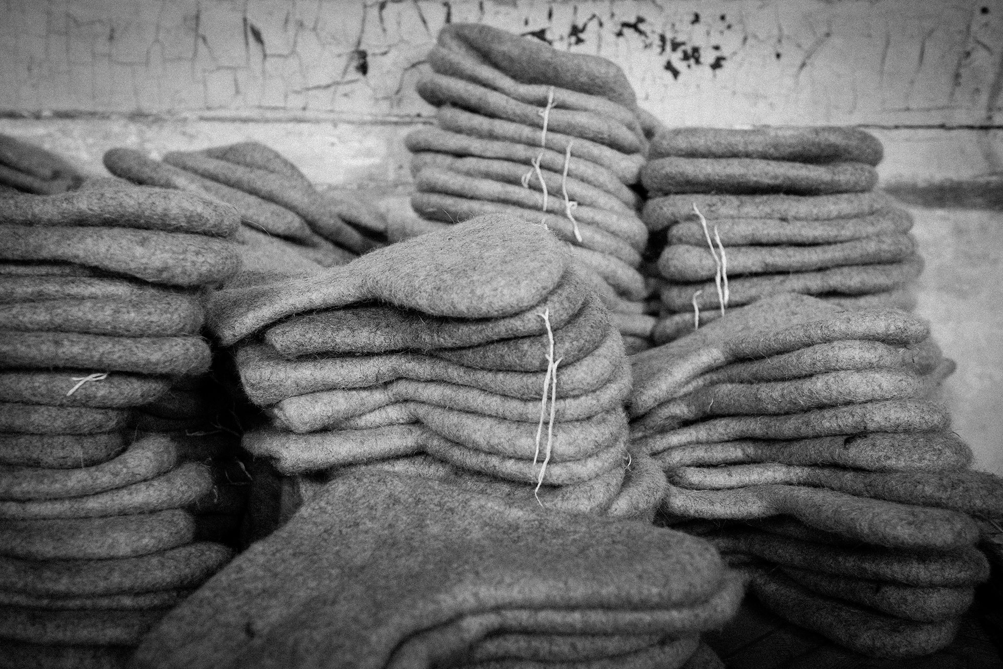 After several rounds of felting, these are the basic slipper shapes (at Angel Felting).