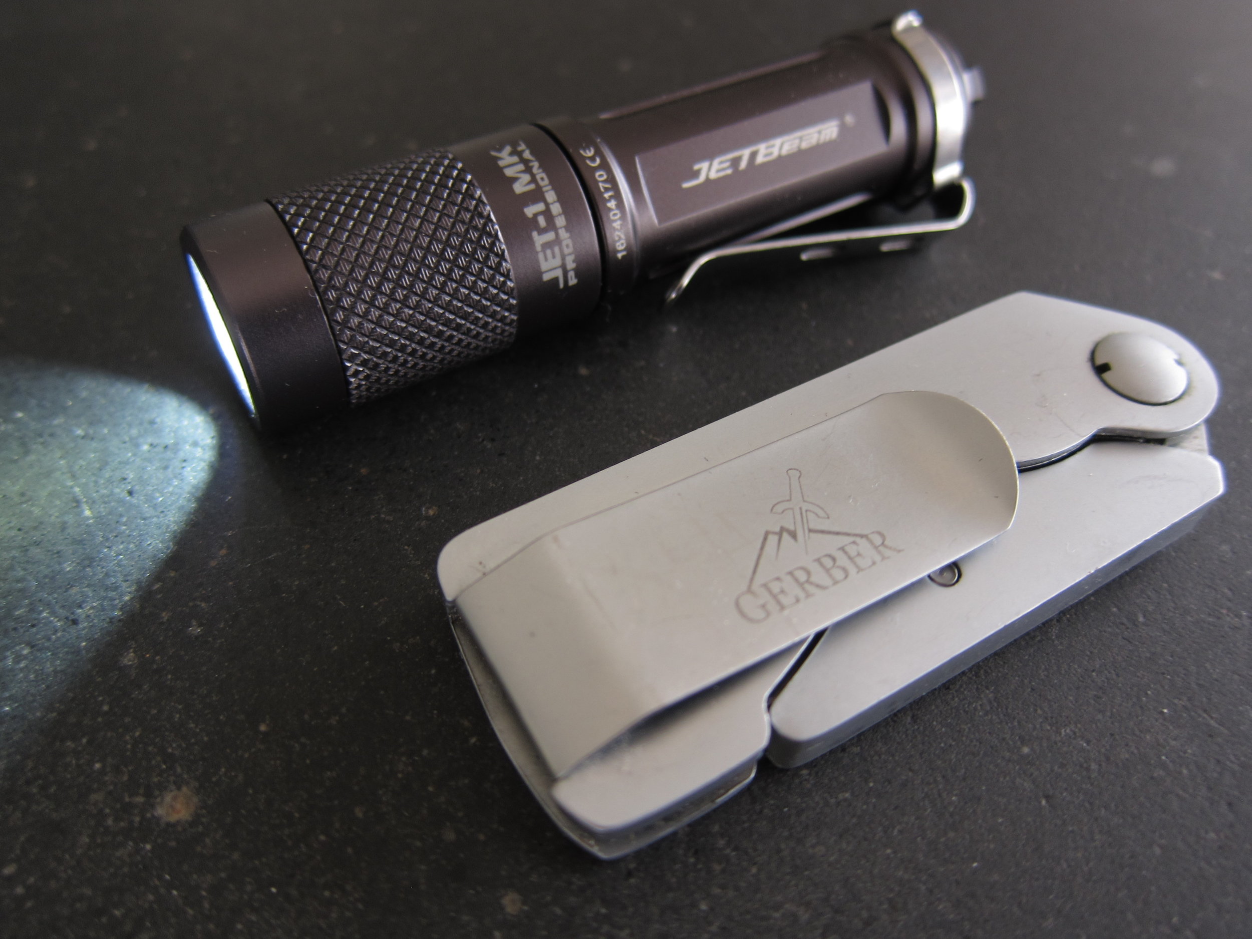 Jetbeam Jet-1 MK Professional with the equally diminutive Gerber EAB knife.  