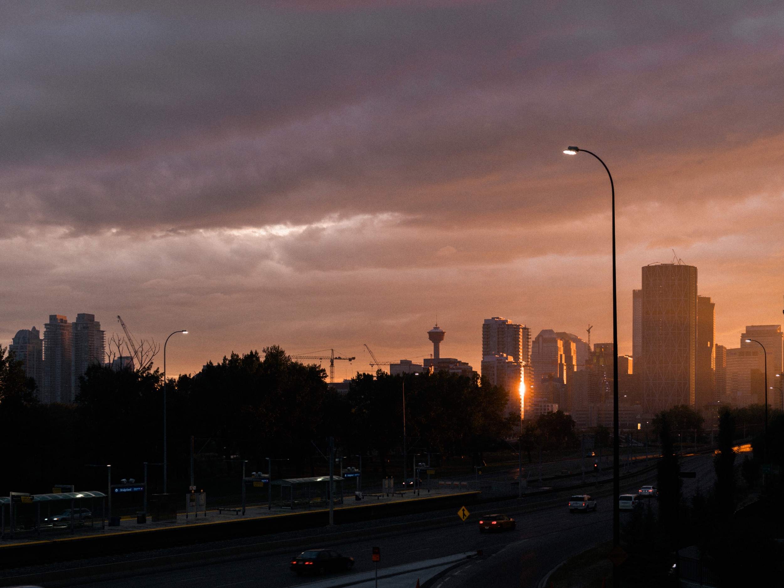  This sunset was dramatic. I've been watching the photographers I look up to closely and, unsurprisingly, noticed they rarely take pictures of a sunset. What they do instead is find an interesting subject and make a photo of it  at  sunset. I think t