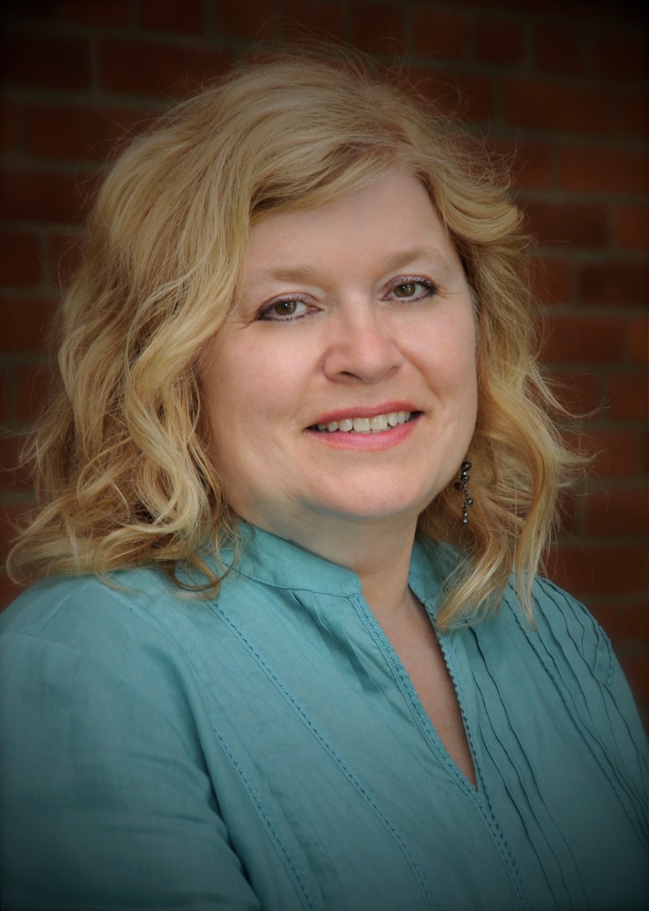 Annie's education in design and color theory classes at the Cleveland Institute of Art, along with a variety of color and cutting seminars, have made her sought after for her corrective color work and her ability to match any color with her clients' hair.
