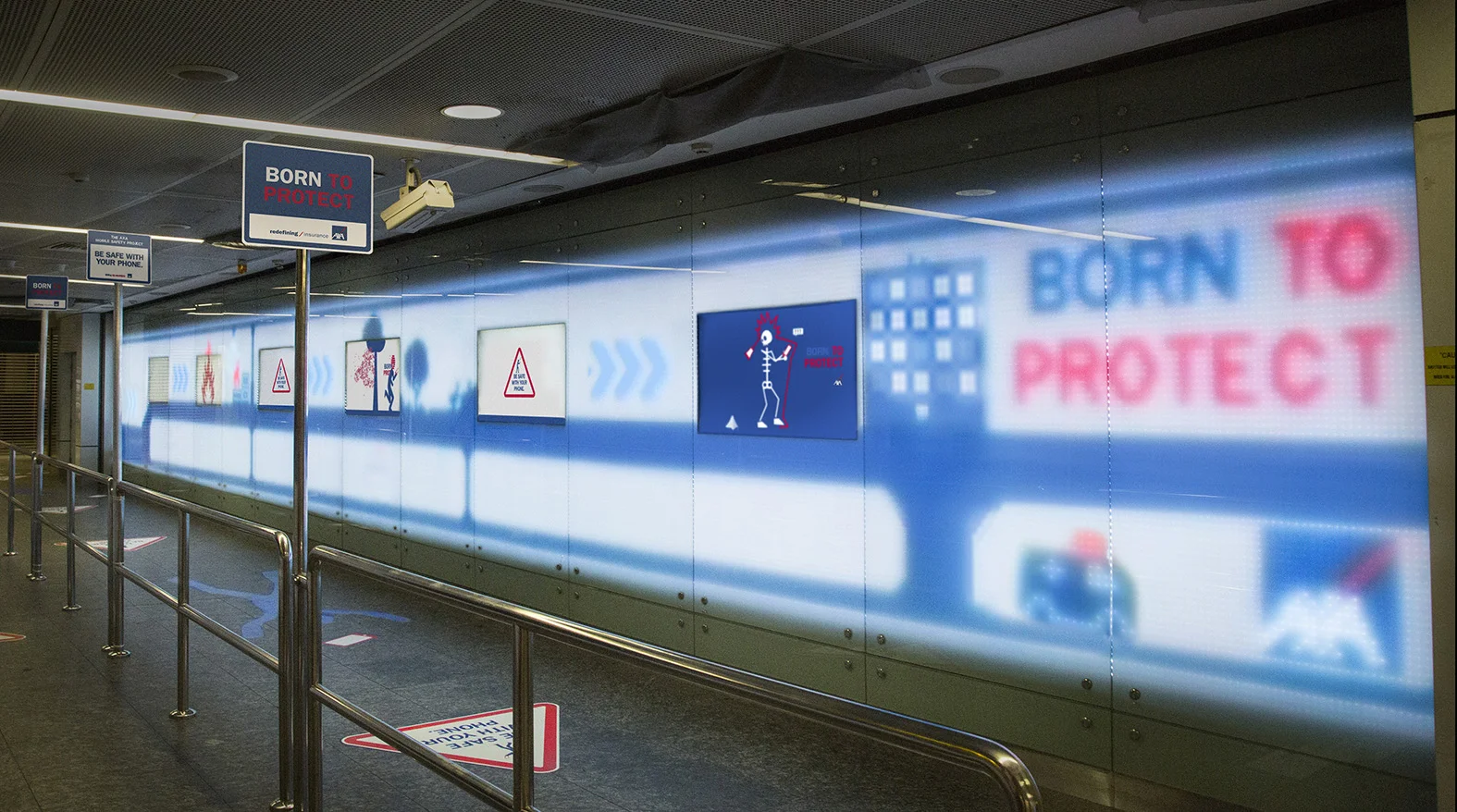 The interactive walkway featuring screens that mirror people walking past.