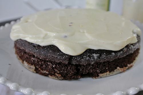 chocolate layer cake with mimosa creamsicle frosting first layer frosted.jpg