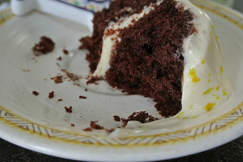 chocolate layer cake with mimosa creamsicle frosting eaten slice detail.jpg