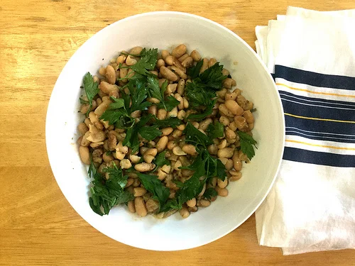 white wine-braised white beans and garlic table.jpg