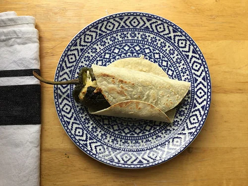 tortilla-wrapped poblano stuffed with corn and almond pate table.jpg