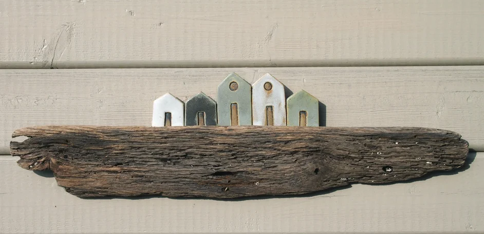Emma huts on wood.jpg