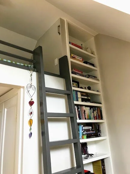 Tdd Wintner Loft with books WEB.jpeg