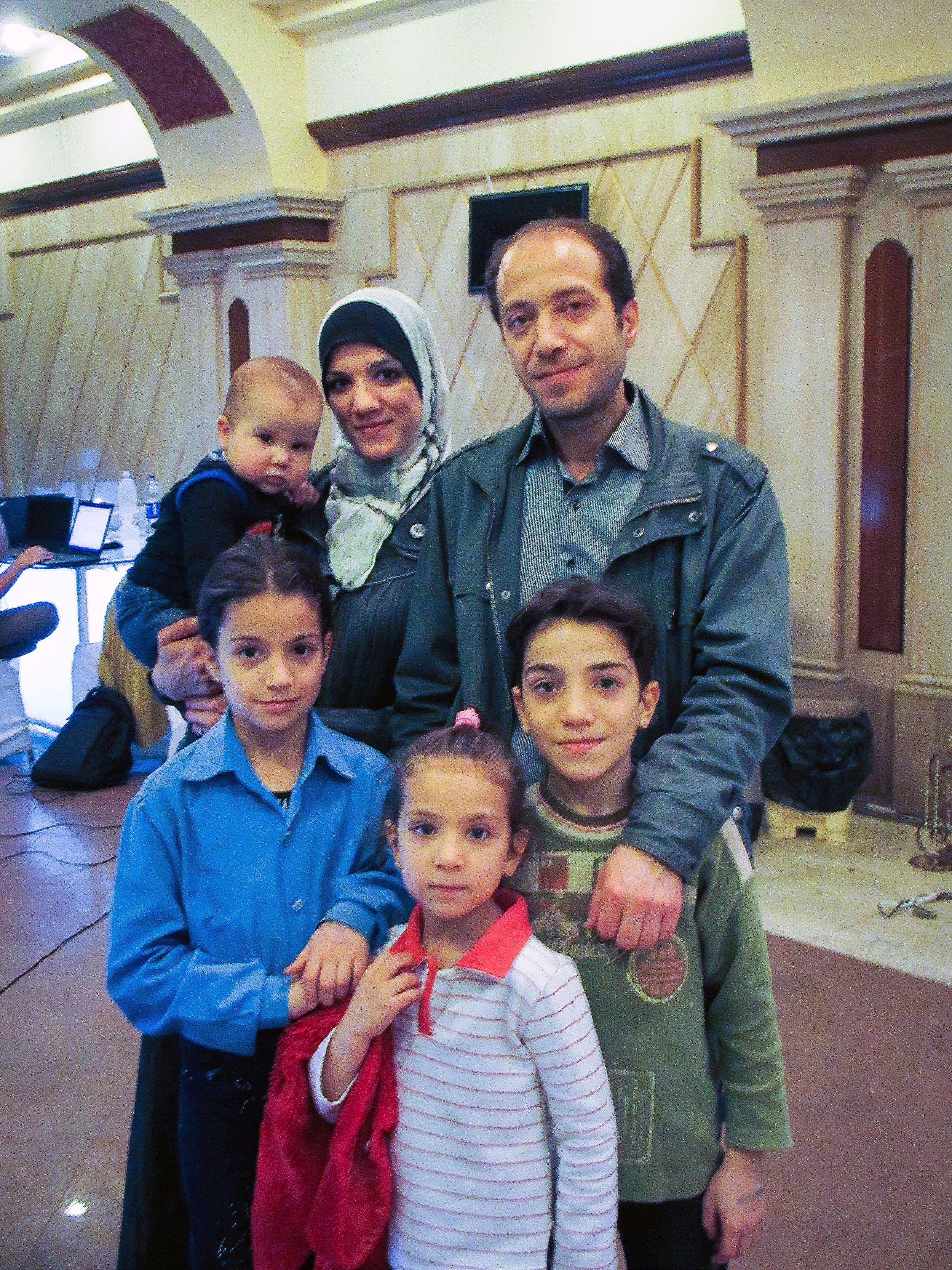 A family waits for UNHCR Registration.