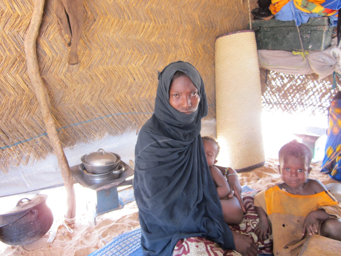 A family survives harsh conditions during a drought in the Sahel.