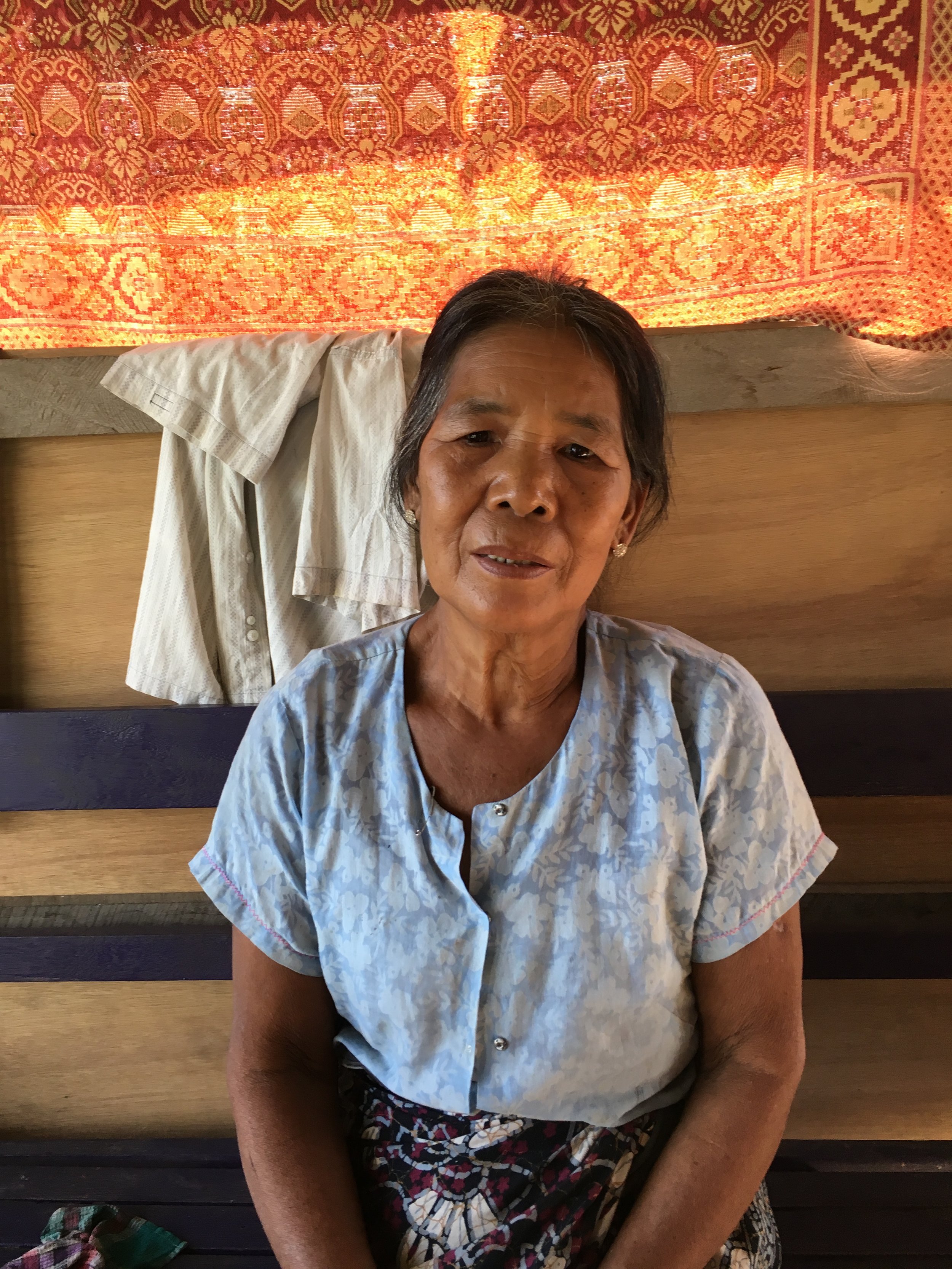 Massive floods in 2015 washed away this woman’s home and most of her village in Kale Township, Sagaign Region. She and her family have now been relocated to another site by local authorities where they are struggling to rebuild their lives.
