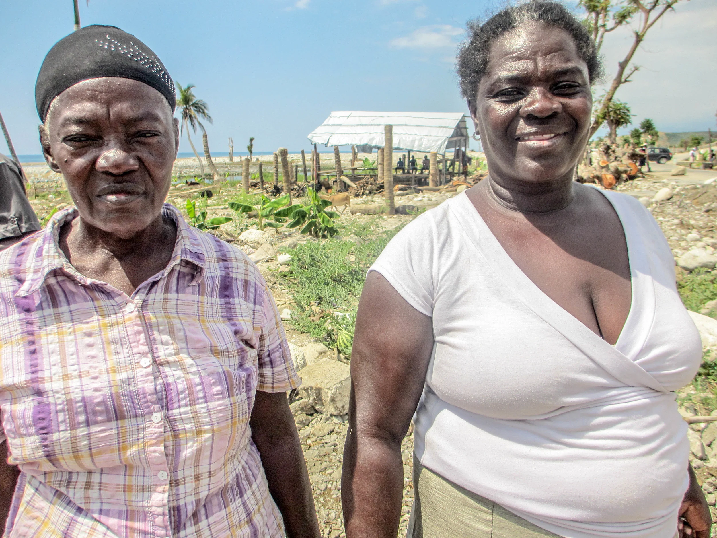 The homeless woman is now living with her sister, seen here. Many Haitian adults and children who lost their homes in the hurricane are relying on family and neighbors for shelter, sharing crowded living quarters. Host families are struggling to meet the added burden.