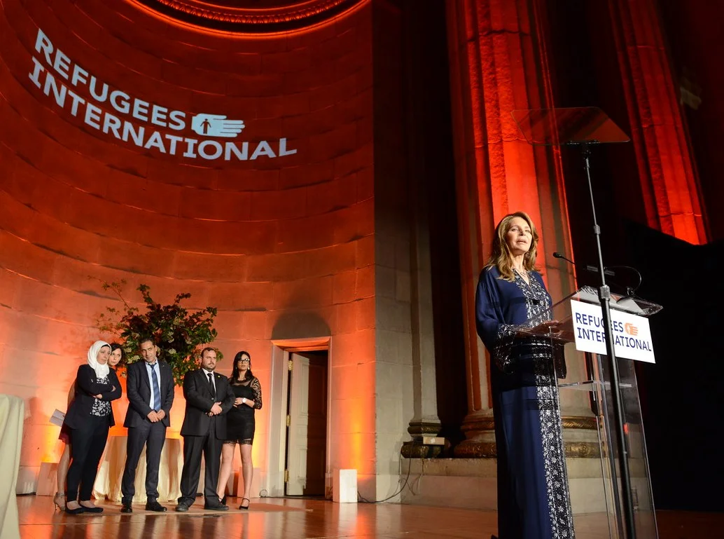 Her Majesty Queen Noor Al-Hussein of Jordan presents the McCall-Pierpaoli Award to the White Helmets.