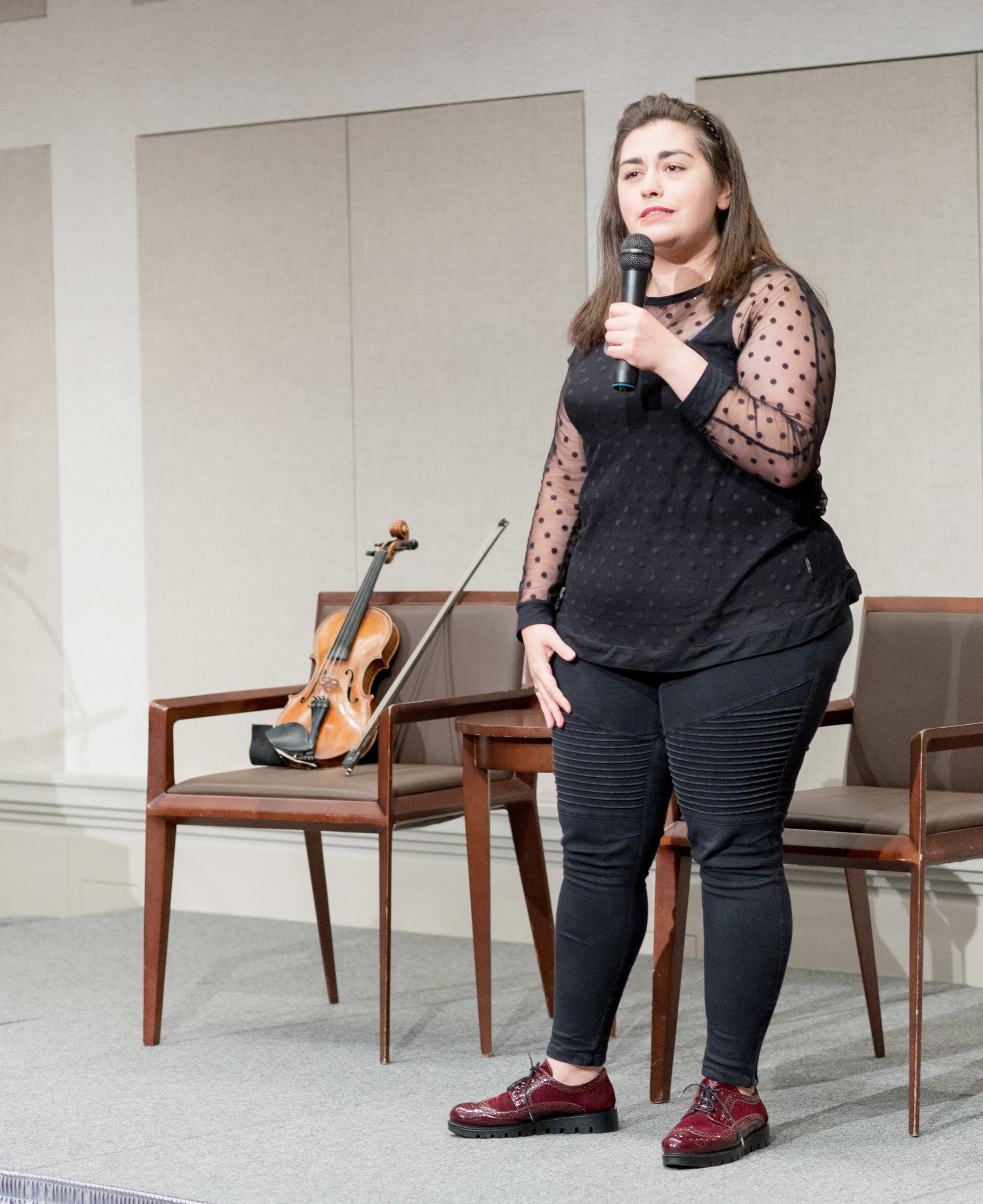 Mariela Shaker, celebrated Syrian violinist and refugee from Aleppo, performed at the event.