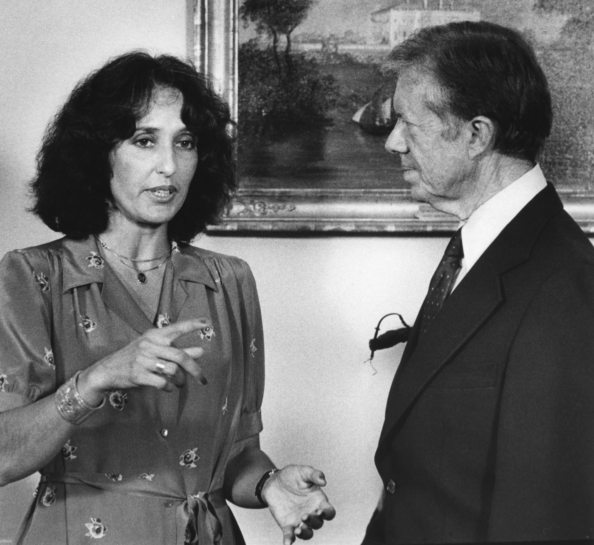 President Carter talks with singer Joan Baez in the Oval Office of the White House in Washington in 1979. Baez just returned from a fact-finding trip in Southeast Asia. (UPI Photo/Frank Cancellare/Files)