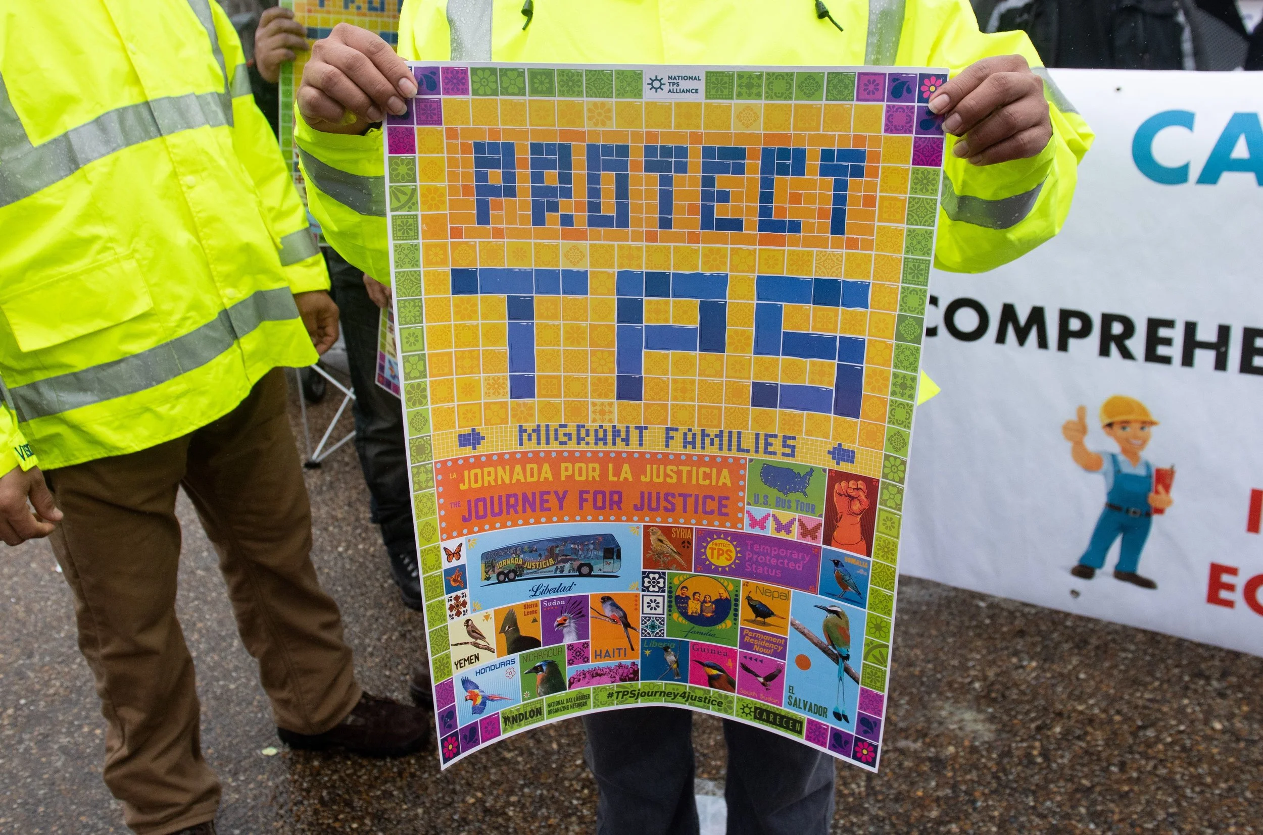 Demonstrators participate in the March for Temporary Protected Status (TPS) Justice at a protest outside the White House. Photo Credit: SAUL LOEB/AFP/Getty Images.