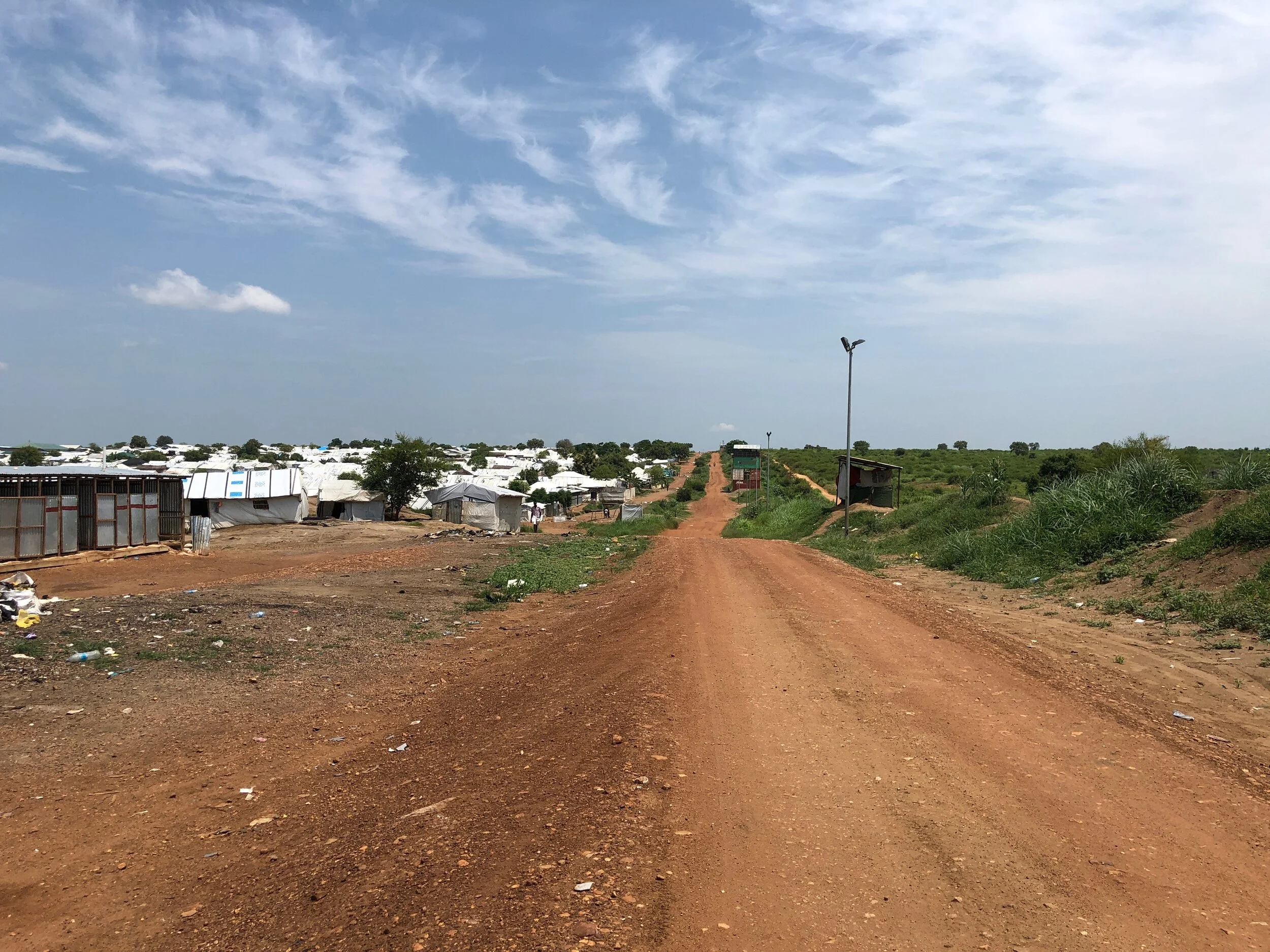 Outside perimeter of the Juba PoC. Photo Credit: Devon Cone/Refugees International.