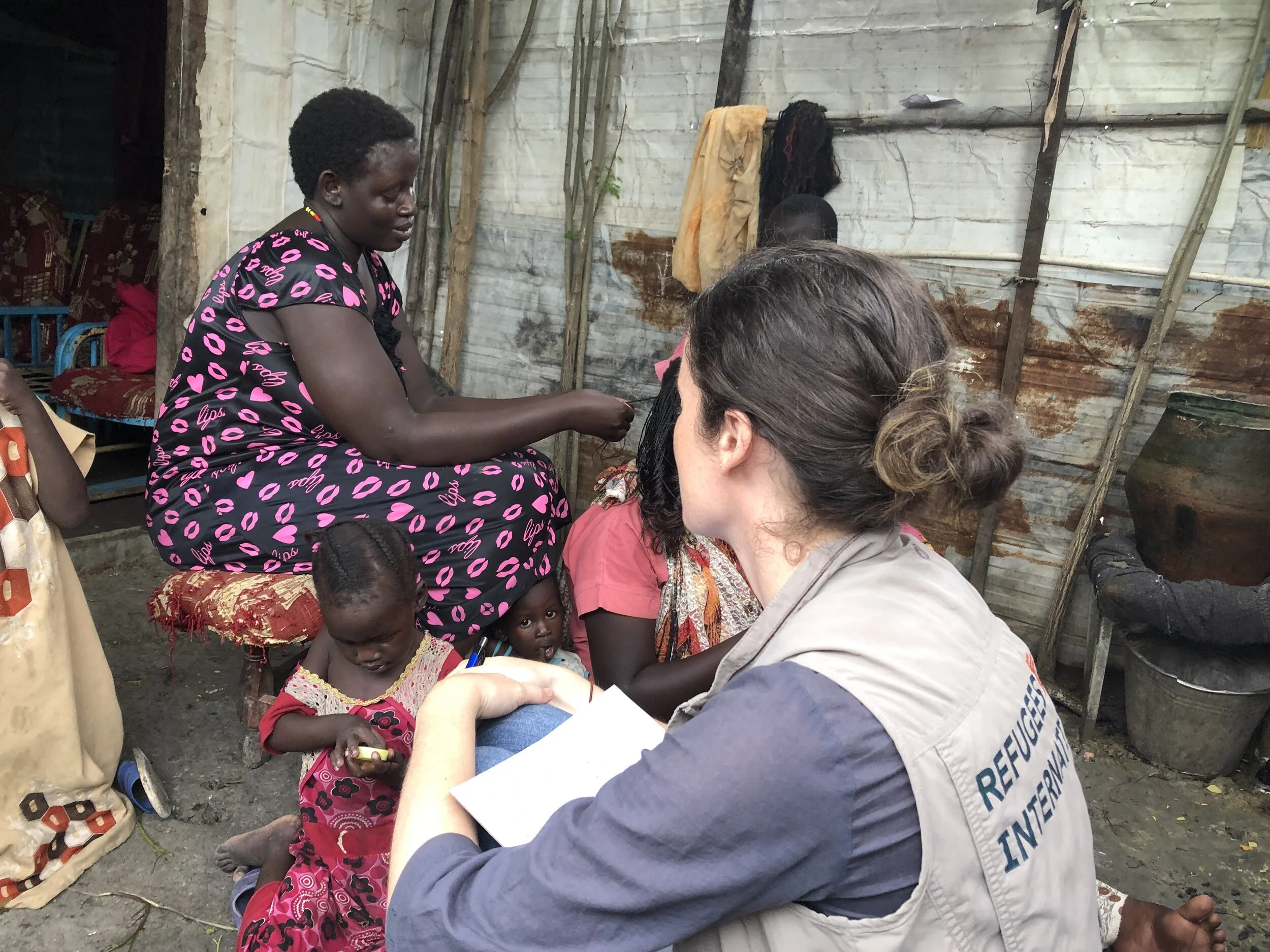 Refugees International Senior Advocate for Women and Girls Devon Cone interviews an internally displaced woman in South Sudan.