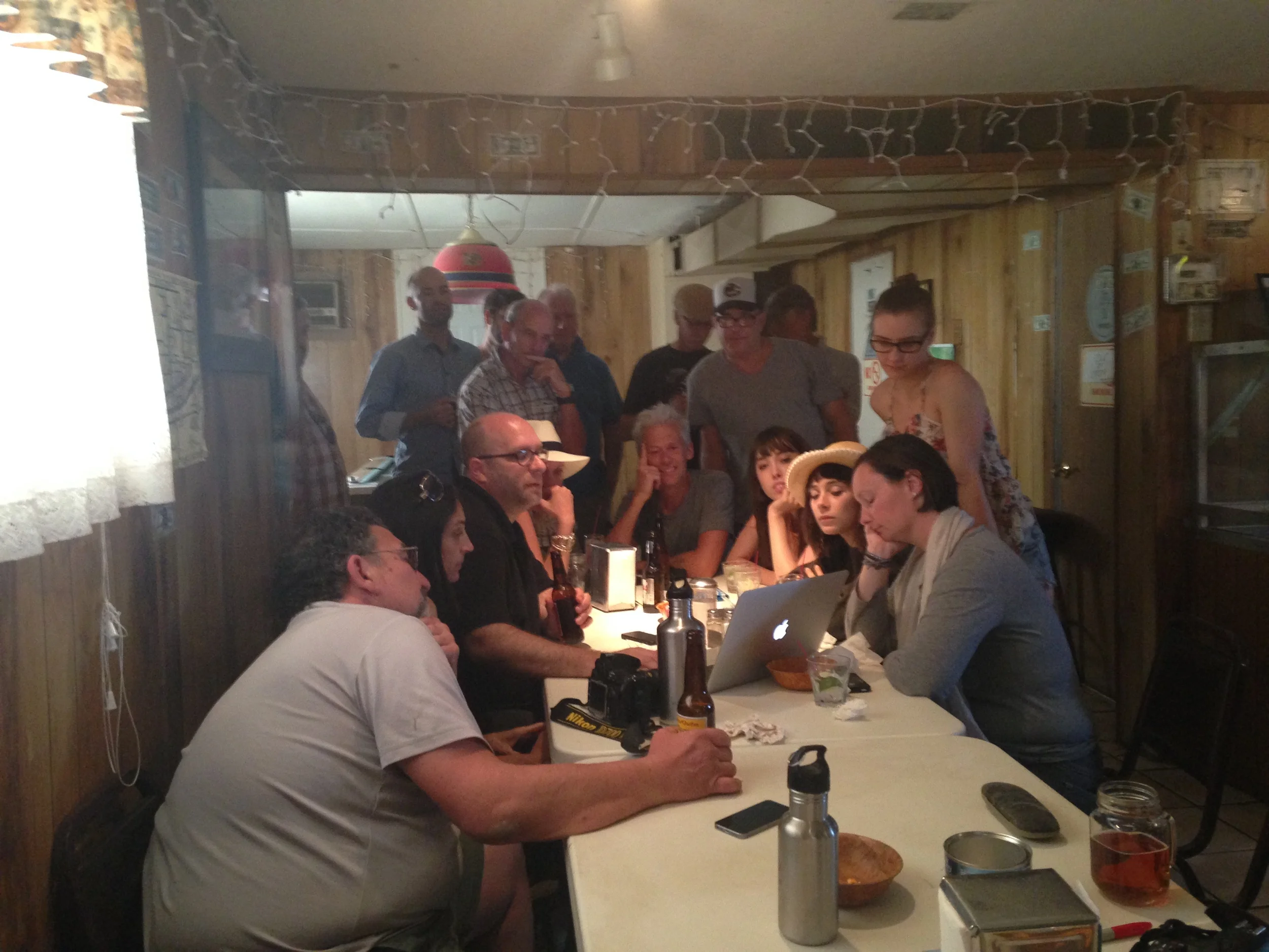 Todd showing work to the group in the Ski Inn. 