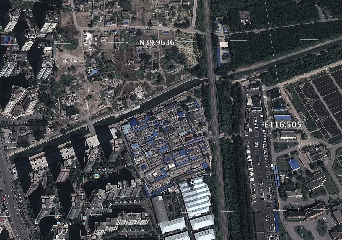 Location of a demolished area. In the East is the railway, which can be seen in one of the photos. - Satellite photo: Google Earth (on the 11th of October, 2013)