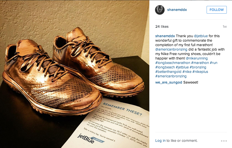 One of the first-time marathoners' shoes with the return letter.