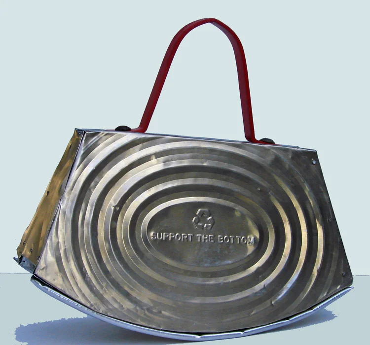 purse sculpture.recycled .found objects.silver.red.jpg