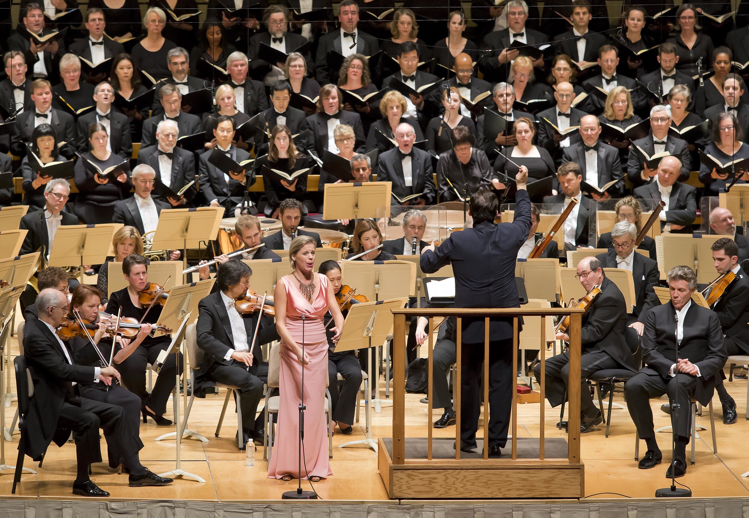Soprano Camilla Tilling, with music director Andris Nelsons and the Boston Symphony Orchestra, performing Brahms' Ein Deutsches Requiem. Winslow Townson photograph.