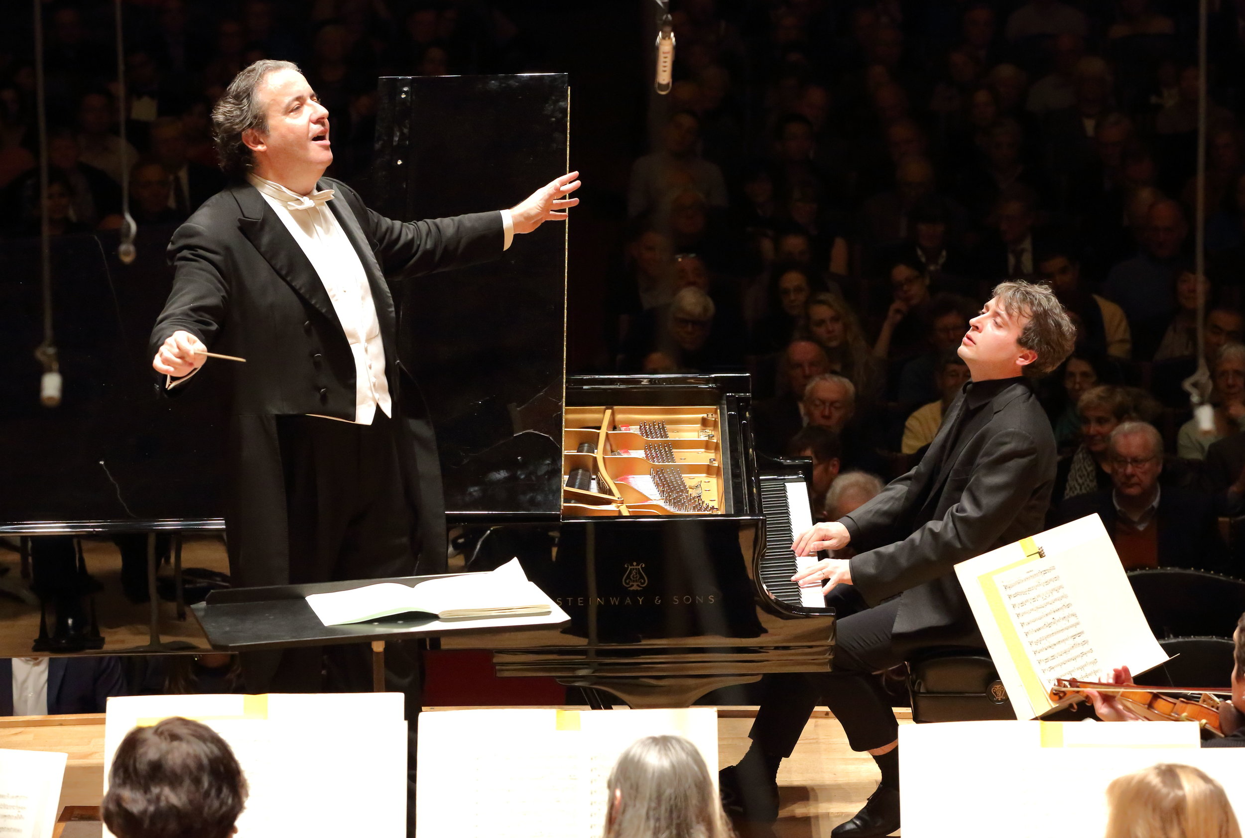 Juanjo Mena conducts the Boston Symphony Orchestra with pianist Jean-Frédéric Neuburger, Thursday, Jan. 26 at Symphony Hall. Hilary Scott photograph.