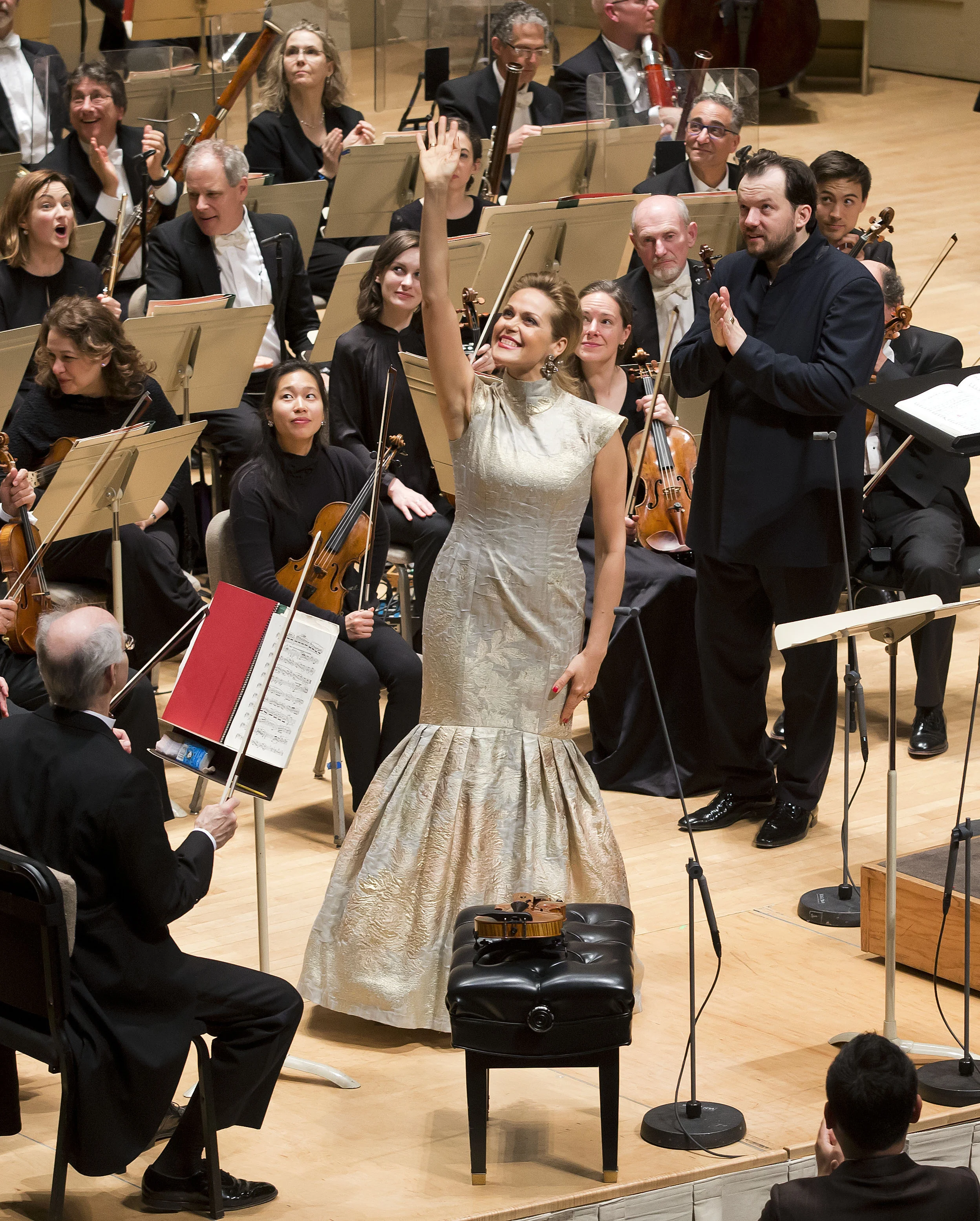 Friends in the balcony? Soprano Kristine Opolais waves after Mahler's Fourth, with Andris Nelsons and the Boston Symphony Orchestra. Winslow Townson photograph.