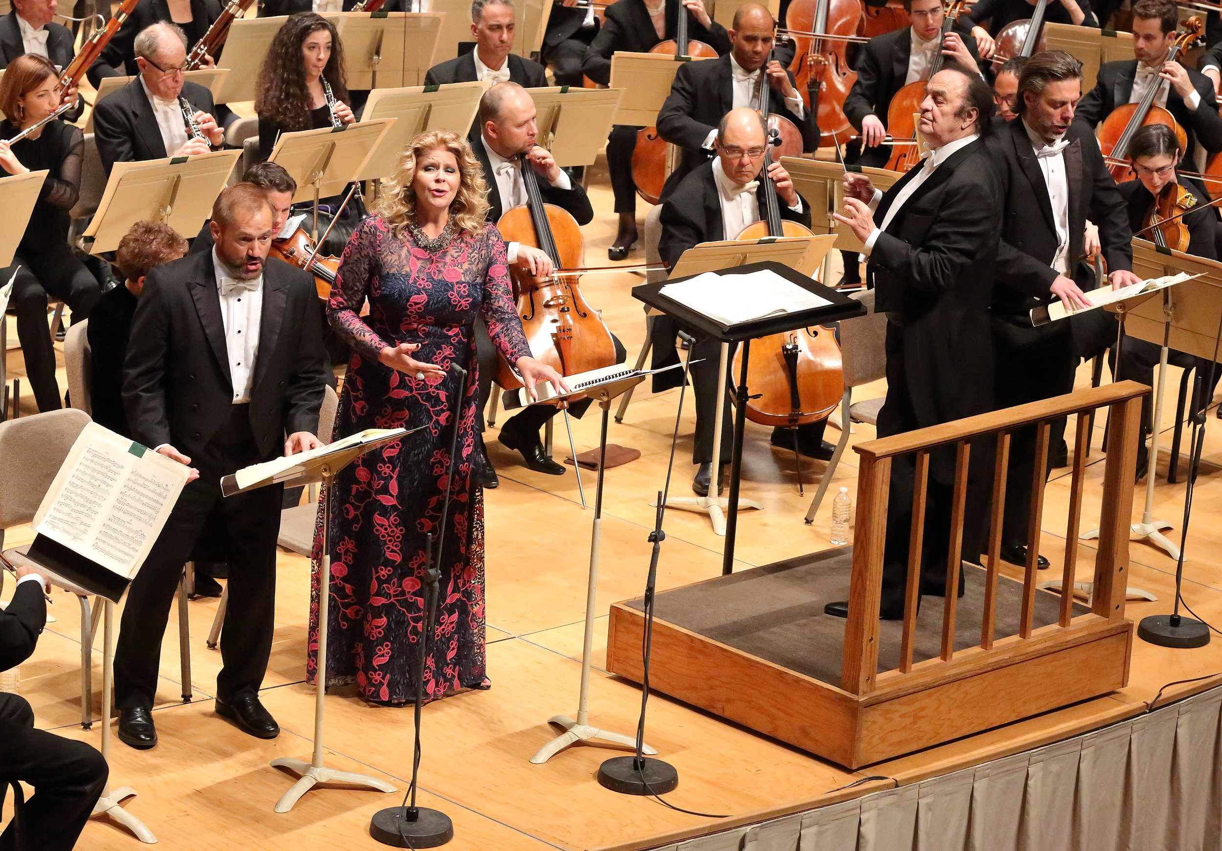 Tenor Paul Groves (left) as Faust, mezzo Susan Graham as Marguerite, bass-baritone John Relyea as Méphistophélés (far right). Charles Dutoit conducts the Boston Symphony Orchestra, Oct. 26, 2017. Hilary Scott photograph.