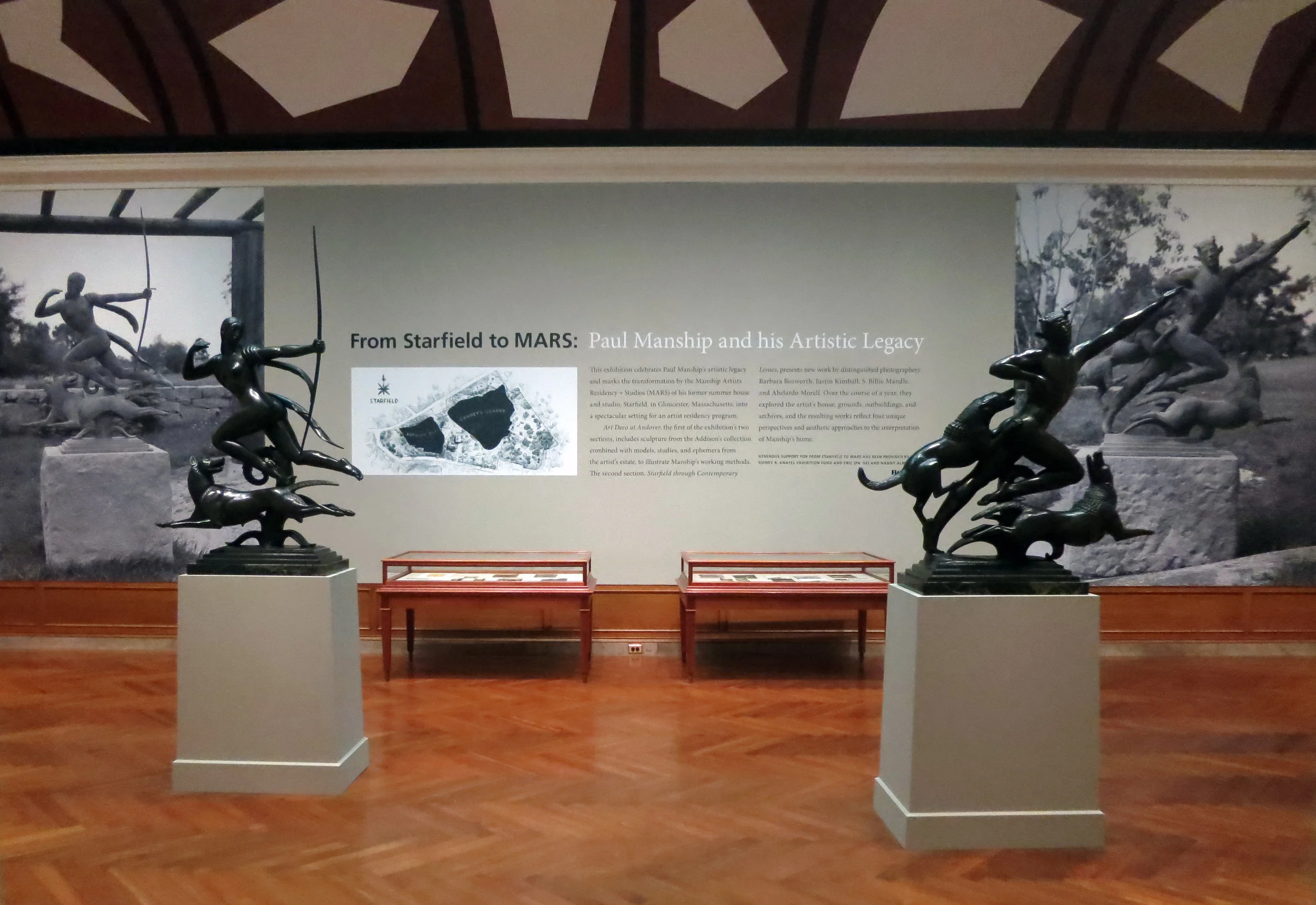 The Addison Gallery entryway to From Starfield to MARS, the work of four photographers in residence at the Manship Artists + Residency Studios. Pictured here: two sculptures from the Addison Gallery of American Art collection by Paul Manship: Diana (l) and Actaeon (r).
