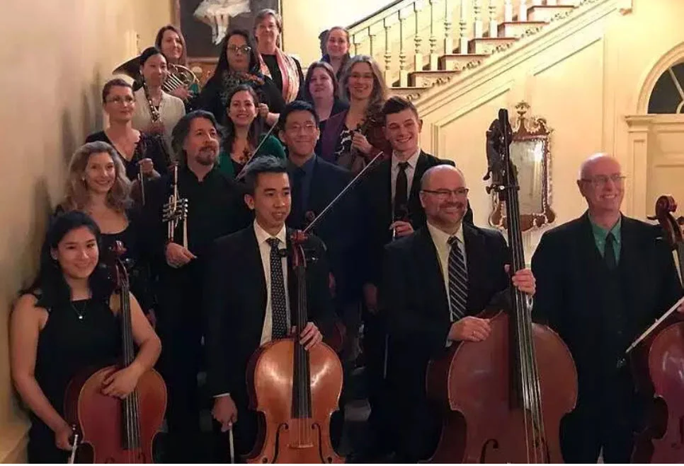 Ipswich’s The Orchestra on the Hill, with director Tom Palance (center-left, with trumpet)