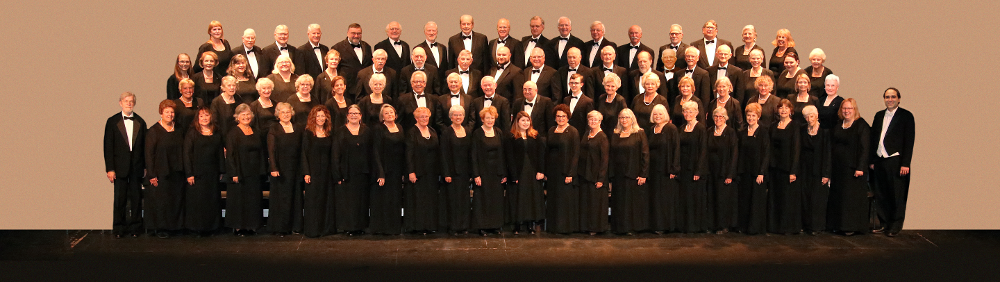 Chatham Chorale, with Joseph Marcio, director (far right) and Donald Enos (accompanist, far left).