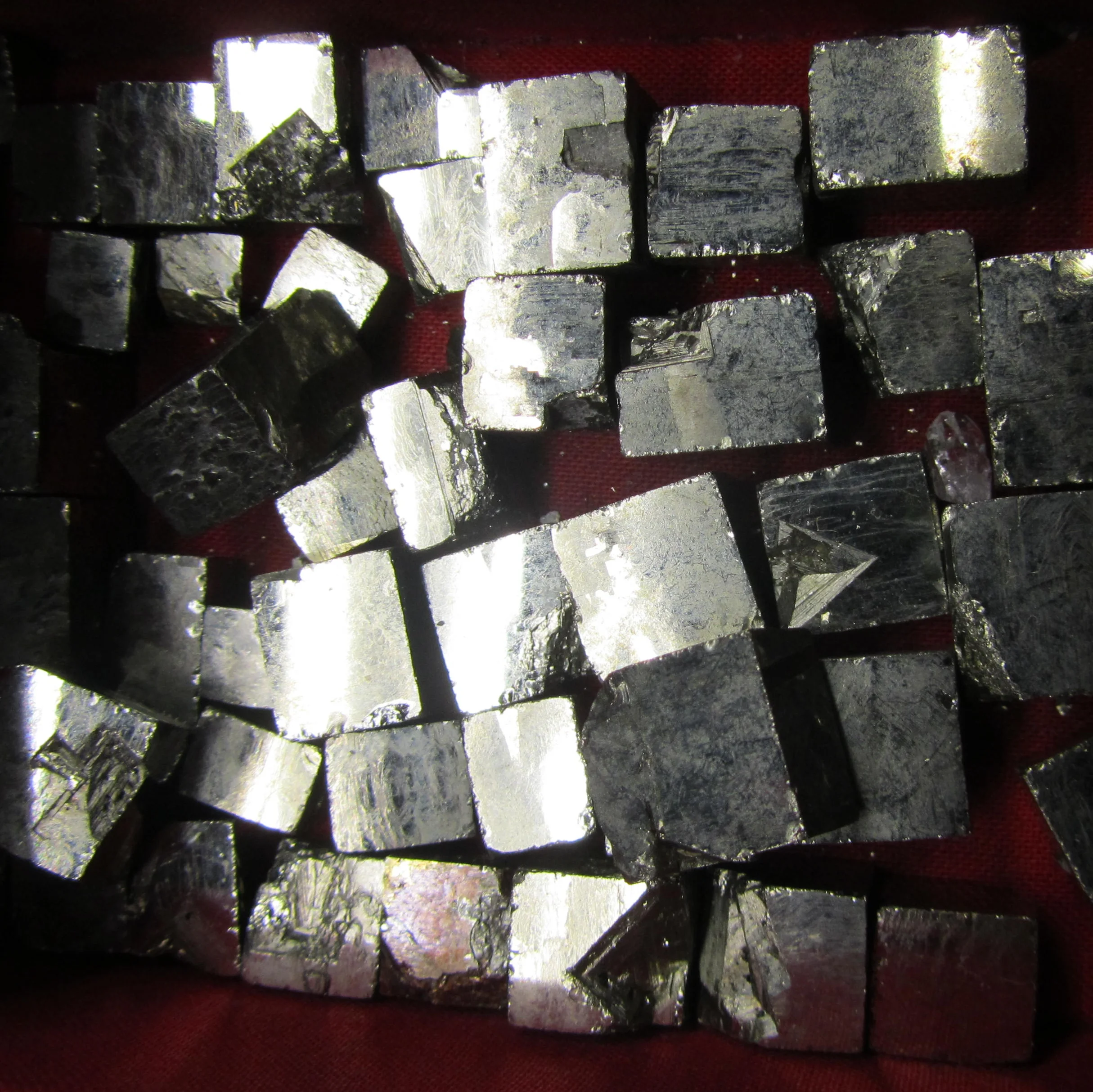 Box of pyrite specimens: A cube of cubes...