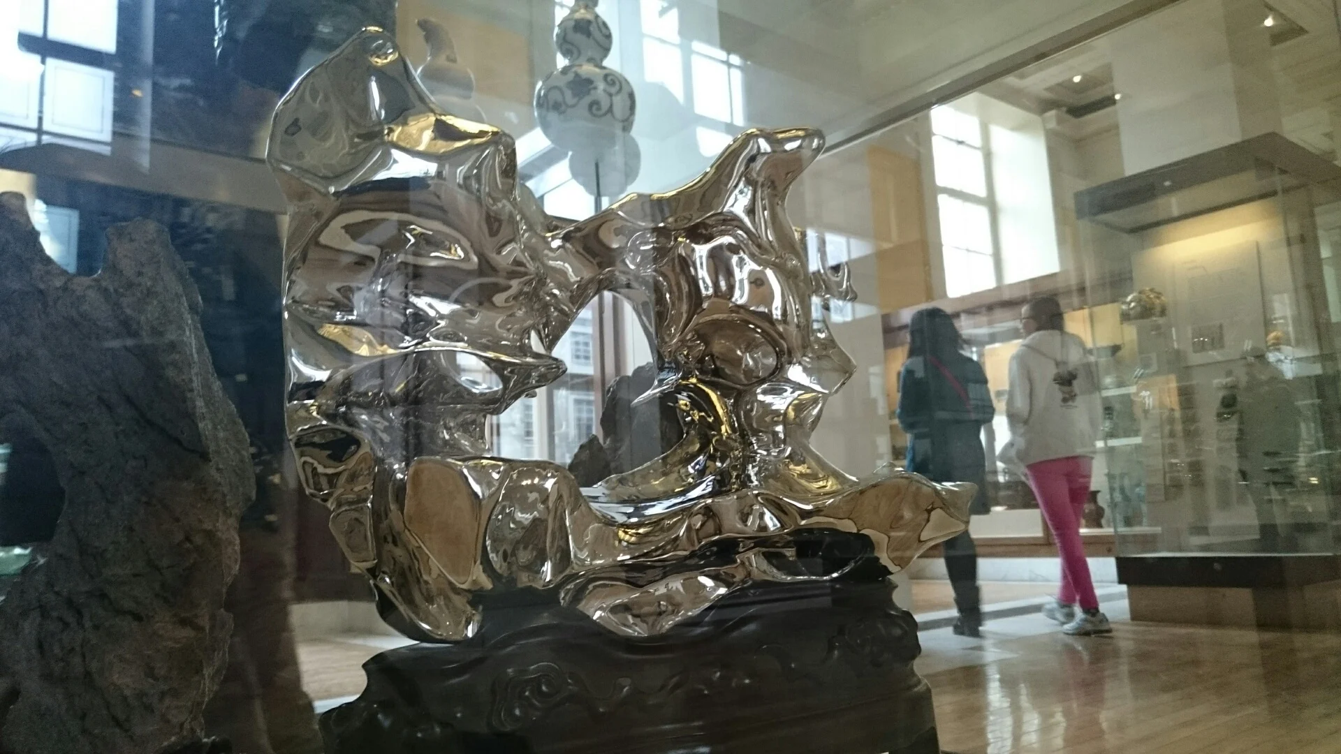 Artificial Rock, number 82 by Zhan Wang. Polished stainless steel