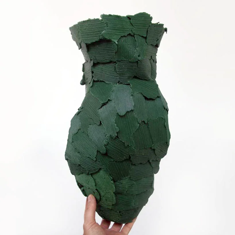 One of Marigold's "Wooden Forms" where he uses wax to capture the surface texture of wood. The fragmented, fragile looking shapes are then cast in materials like iron.
