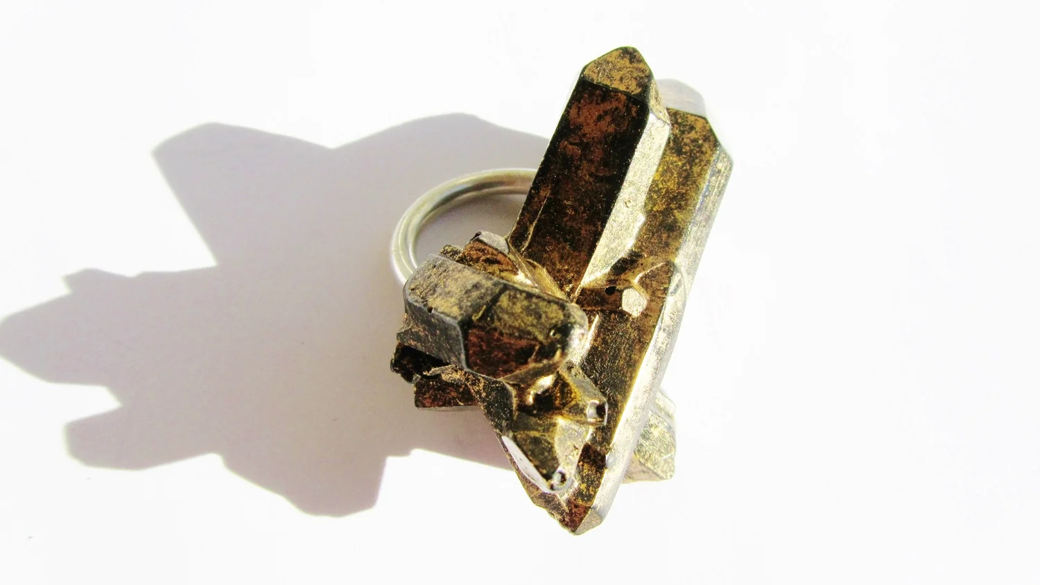 I love working with the real objects, casting and capturing their forms like my Gold Shard ring based on the shape of quartz