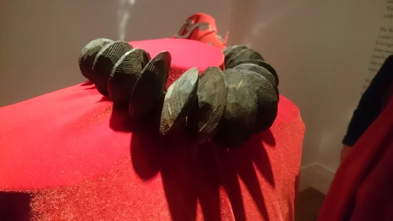 Wooden shapes in charcoal black in this striking piece by Calder