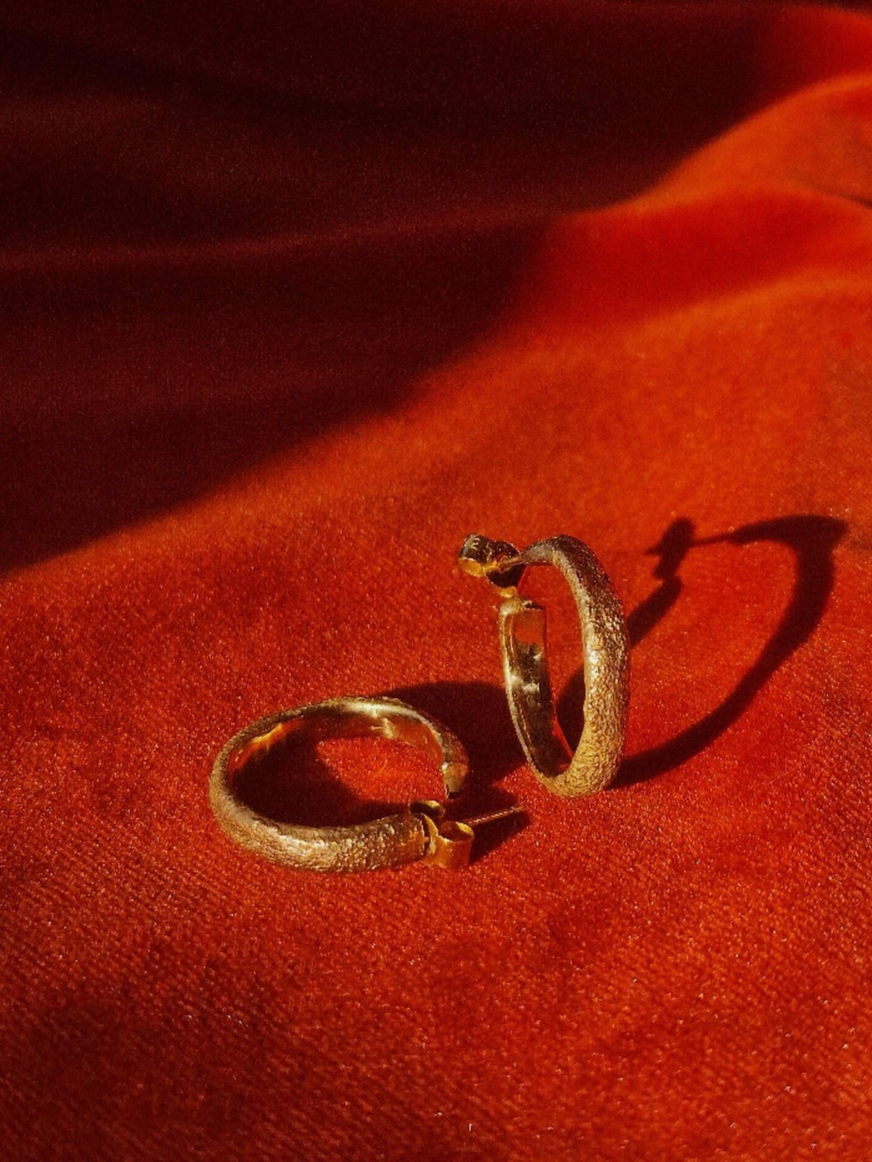 jade+mellor+bronze+9ct+gold+caddis+hoop+earrings.jpg