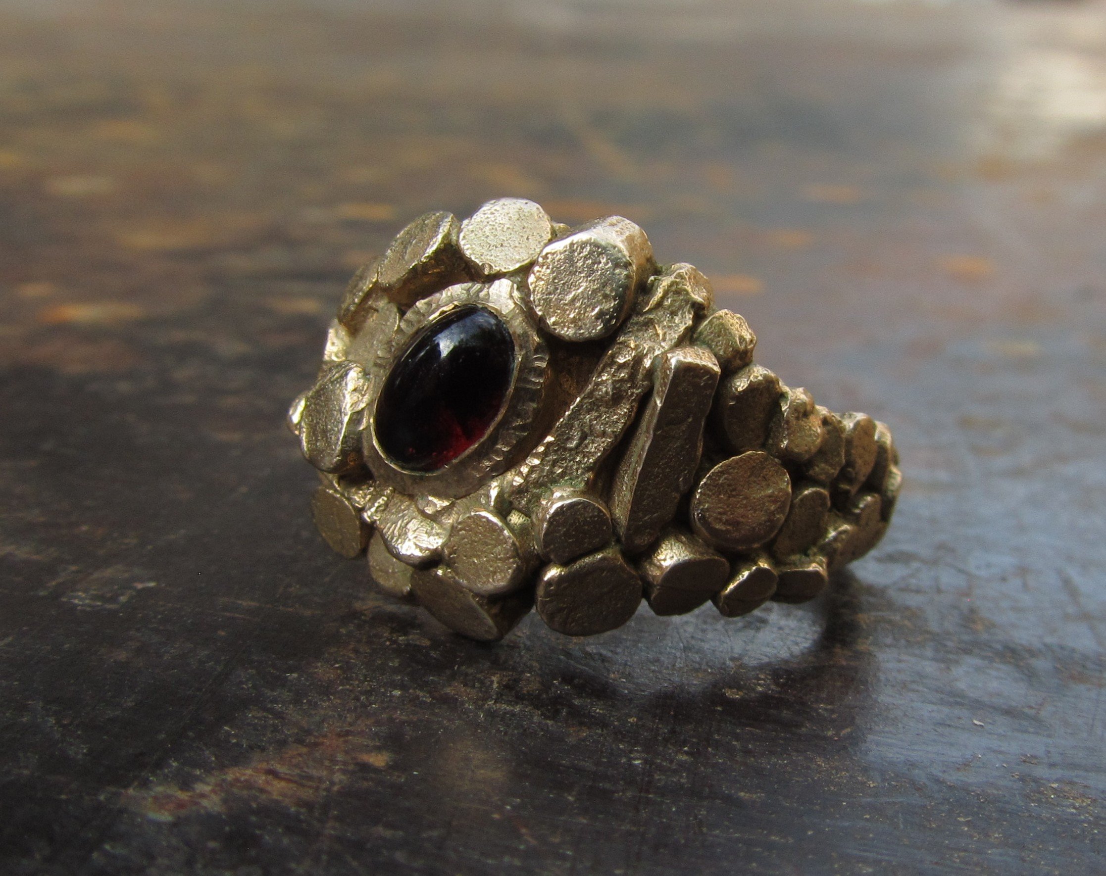 jade mellor garnet bronze caddis cluster ring side view.JPG