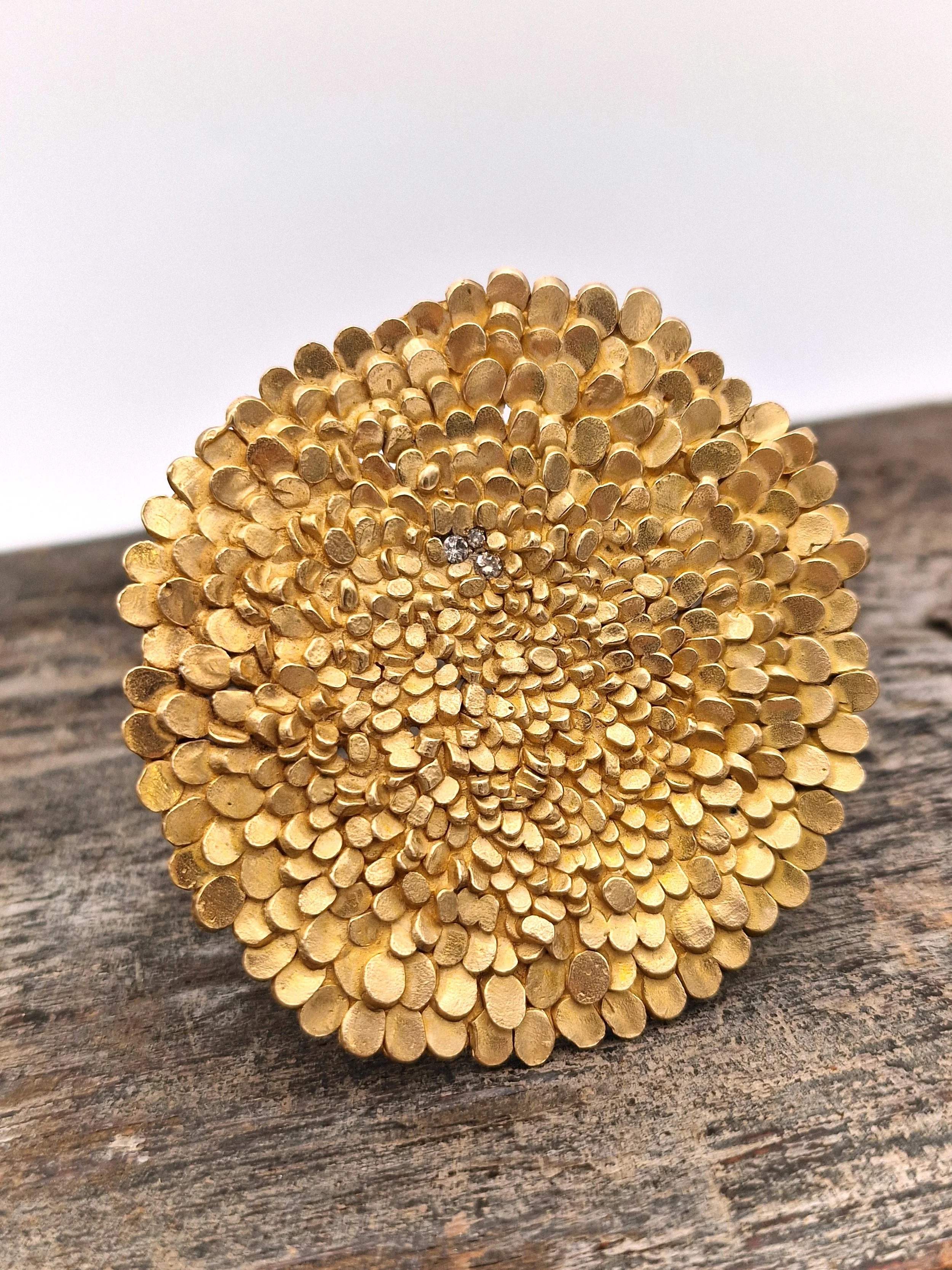 jade mellor bronze brooch champagne diamonds collect 2026.jpg