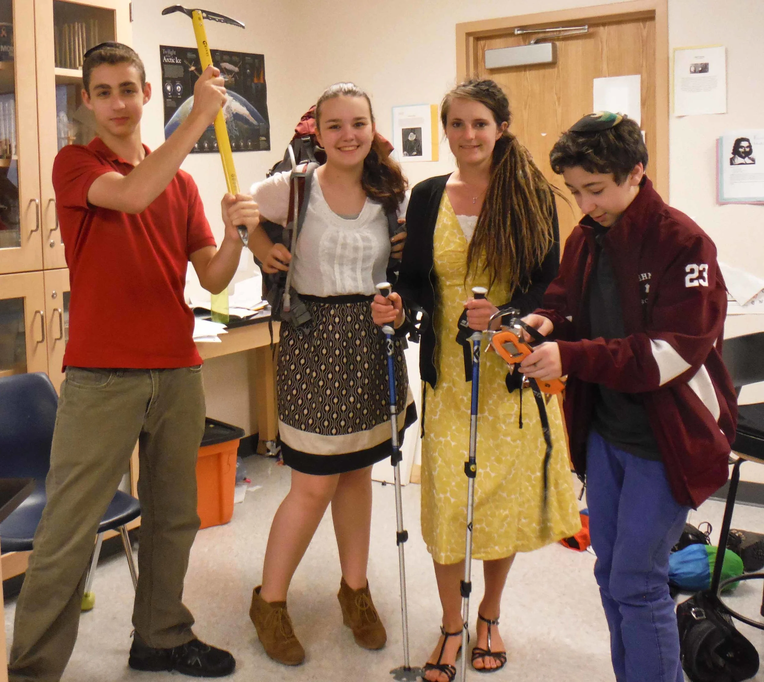 Students at the Hebrew High School of New England help Sarah (second from right) model some of the gear that she'll use to traverse the Juneau Icefield. "They can't wait to see how I use an ice axe." 