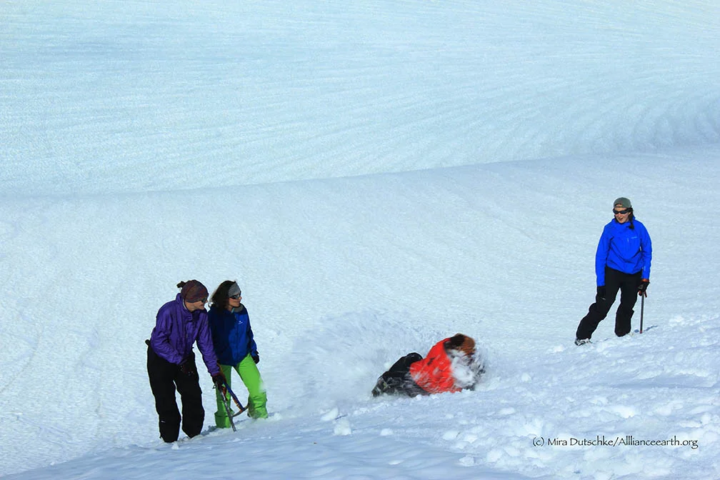 Mira Dutschke, Justyna Dudek, Molly Blakowski and Annie Boucher practicing their self arrest skills on the side of Cairn Peak. Photo: Jeff Barbee