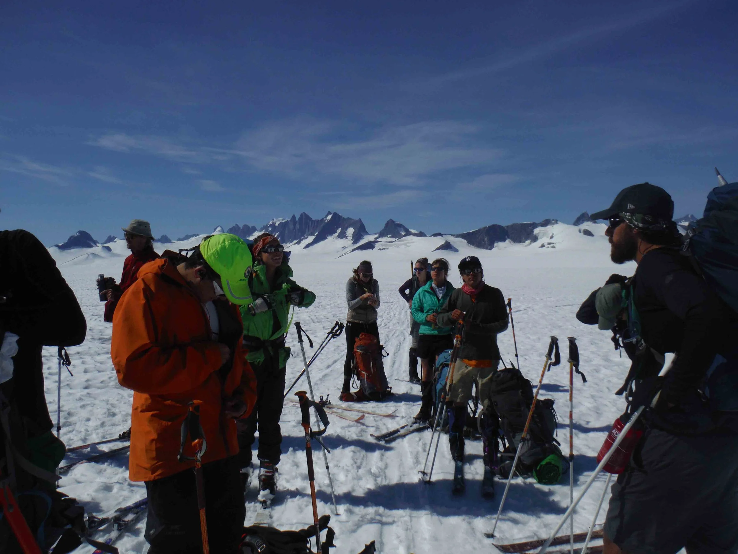 The trail party takes a snack break, changes some layers and rests for a minute before hitting the trail again. Photo by Sarah Bouckoms